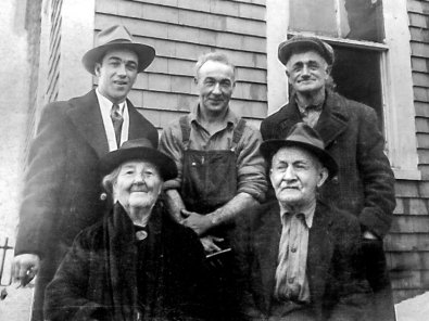 Jimmy & Raymond Goyetche of Petit de Grat, NS; with Charles Honoré (Henry) Boudrot and his wife Marie Martel and Willie Boudreau (1947)