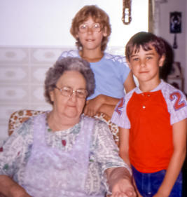 Maria Goyetche of Petit de Grat, NS with great grandchildren Julie & Chris (1984)